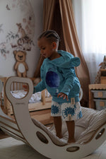 Baumwoll-Kinder-Shorts Suns – Bequeme Sommerhose mit Sonnen-Muster aus OEKO-TEX Baumwolle – Produktbild 1